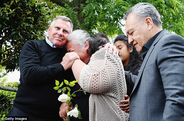 Former All Blacks head coach John Hart comforts mother of Jonah Lomu, Hepi Lomu with father of Lomu's wife Nadine, Mervyn Kuiek Read more: http://www.dailymail.co.uk/news/article-3326400/Jonah-Lomu-s-mother-breaks-remembering-rugby-great-s-revealed-sudden-death-caused-heart-attack-related-kidney-problems.
